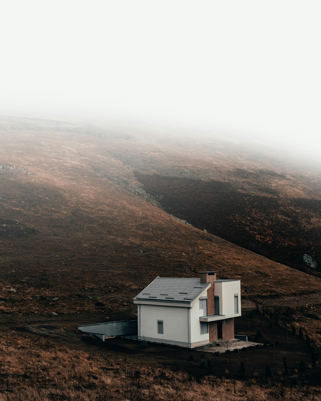 Moody Mountain House Wallpaper