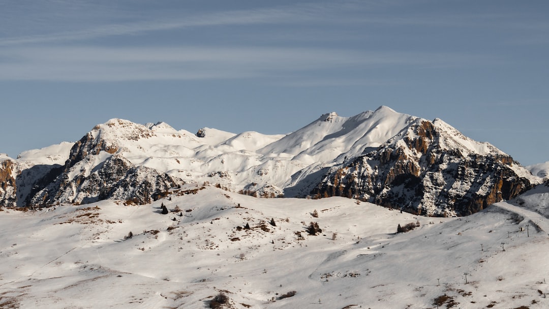 Blue Sky Snowy Peaks Wallpaper